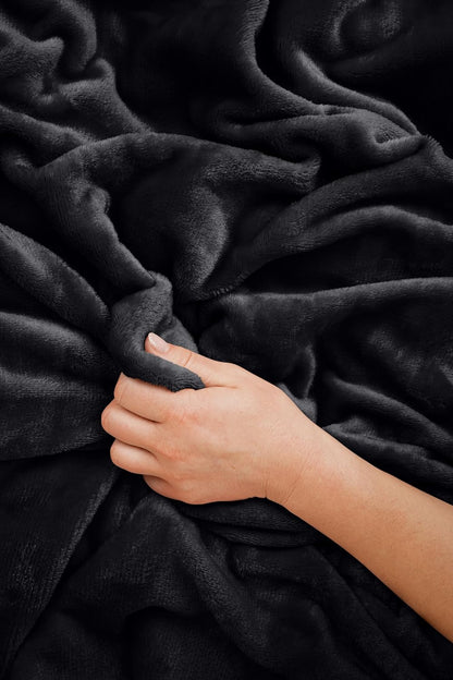 Travel Blanket and Pillow - Ultra-Soft, Compact & Lightweight, 65x40 Inches, with Carry Case, Luggage Sleeve & Backpack Clip for Airplane Comfort (Black)